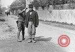 Image of US soldier teaches Asian man close order drill France, 1918, second 11 stock footage video 65675076719
