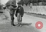 Image of US soldier teaches Asian man close order drill France, 1918, second 12 stock footage video 65675076719