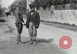 Image of US soldier teaches Asian man close order drill France, 1918, second 13 stock footage video 65675076719