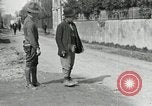 Image of US soldier teaches Asian man close order drill France, 1918, second 14 stock footage video 65675076719