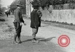 Image of US soldier teaches Asian man close order drill France, 1918, second 15 stock footage video 65675076719