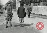 Image of US soldier teaches Asian man close order drill France, 1918, second 16 stock footage video 65675076719