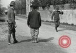 Image of US soldier teaches Asian man close order drill France, 1918, second 17 stock footage video 65675076719