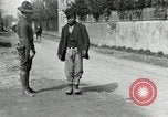 Image of US soldier teaches Asian man close order drill France, 1918, second 19 stock footage video 65675076719