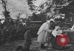 Image of US 101st Airborne soldiers in Battle of Bulge Bastogne Belgium, 1945, second 1 stock footage video 65675076741