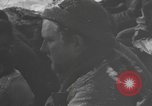 Image of US 101st Airborne soldiers in Battle of Bulge Bastogne Belgium, 1945, second 10 stock footage video 65675076741