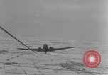 Image of US 101st Airborne soldiers in Battle of Bulge Bastogne Belgium, 1945, second 48 stock footage video 65675076741