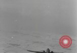 Image of US 101st Airborne soldiers in Battle of Bulge Bastogne Belgium, 1945, second 52 stock footage video 65675076741