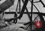 Image of Soldiers and airplanes of 9th Troop Carrier Command Bastogne Belgium, 1945, second 26 stock footage video 65675076742