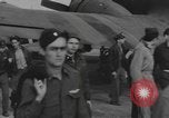 Image of Soldiers and airplanes of 9th Troop Carrier Command Bastogne Belgium, 1945, second 31 stock footage video 65675076742