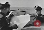 Image of Soldiers and airplanes of 9th Troop Carrier Command Bastogne Belgium, 1945, second 37 stock footage video 65675076742