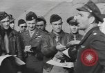 Image of Soldiers and airplanes of 9th Troop Carrier Command Bastogne Belgium, 1945, second 39 stock footage video 65675076742
