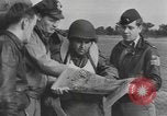 Image of Soldiers and airplanes of 9th Troop Carrier Command Bastogne Belgium, 1945, second 44 stock footage video 65675076742