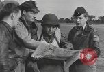 Image of Soldiers and airplanes of 9th Troop Carrier Command Bastogne Belgium, 1945, second 45 stock footage video 65675076742