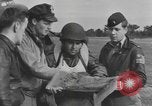 Image of Soldiers and airplanes of 9th Troop Carrier Command Bastogne Belgium, 1945, second 46 stock footage video 65675076742