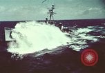 Image of US Navy ships in heavy seas Pacific Ocean, 1971, second 15 stock footage video 65675076787