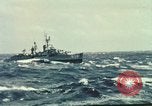 Image of US Navy ships in heavy seas Pacific Ocean, 1971, second 20 stock footage video 65675076787