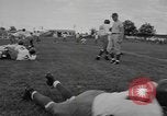 Standbild Fußball-Praxis Colorado United States USA, 1956, aus Sekunde 15 historischem Filmmaterial Videoclip 65675076819