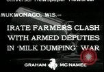 Standbild Milchbauern protestieren gegen Preise und dump Milch Mukwonago Wisconsin USA, 1933, aus Sekunde 1 historischem Filmmaterial Videoclip 65675076834