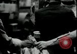 Image of unemployed receive food aid during great depression New York City USA, 1930, second 33 stock footage video 65675076853