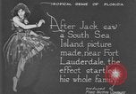 Image of Boy dressed in grass skirt performs hula dance Fort Lauderdale Florida USA, 1920, second 3 stock footage video 65675076871