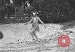 Image of Boy dressed in grass skirt performs hula dance Fort Lauderdale Florida USA, 1920, second 7 stock footage video 65675076871