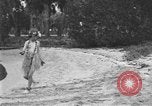 Image of Boy dressed in grass skirt performs hula dance Fort Lauderdale Florida USA, 1920, second 8 stock footage video 65675076871