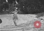 Image of Boy dressed in grass skirt performs hula dance Fort Lauderdale Florida USA, 1920, second 23 stock footage video 65675076871