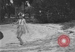 Image of Boy dressed in grass skirt performs hula dance Fort Lauderdale Florida USA, 1920, second 24 stock footage video 65675076871