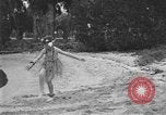 Image of Boy dressed in grass skirt performs hula dance Fort Lauderdale Florida USA, 1920, second 44 stock footage video 65675076871