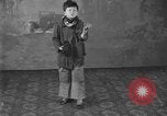 Image of American boy actor Kenneth Hughes on stage United States USA, 1920, second 9 stock footage video 65675076872