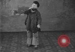 Image of American boy actor Kenneth Hughes on stage United States USA, 1920, second 14 stock footage video 65675076872