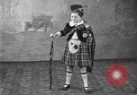 Image of American boy actor Kenneth Hughes on stage United States USA, 1920, second 32 stock footage video 65675076872