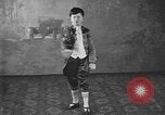 Image of American boy actor Kenneth Hughes on stage United States USA, 1920, second 56 stock footage video 65675076872