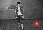 Image of American boy actor Kenneth Hughes on stage United States USA, 1920, second 62 stock footage video 65675076872