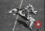 Image of Army versus Rice Football Houston Texas USA, 1958, second 16 stock footage video 65675077064
