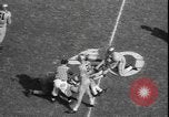 Image of Army versus Rice Football Houston Texas USA, 1958, second 18 stock footage video 65675077064