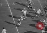 Image of Army versus Rice Football Houston Texas USA, 1958, second 37 stock footage video 65675077064