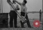 Image of First liquid fuel rocket is launched from Staten Island in New York Staten Island New York USA, 1933, second 8 stock footage video 65675077065