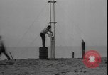 Image of First liquid fuel rocket is launched from Staten Island in New York Staten Island New York USA, 1933, second 14 stock footage video 65675077065