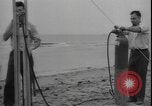 Image of First liquid fuel rocket is launched from Staten Island in New York Staten Island New York USA, 1933, second 19 stock footage video 65675077065