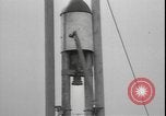 Image of First liquid fuel rocket is launched from Staten Island in New York Staten Island New York USA, 1933, second 29 stock footage video 65675077065