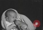 Standbild Amerikanische Umsiedler aus Zweiten Weltkrieg Vereinigtes Königreich New York United States USA, 1940, aus Sekunde 29 historischem Filmmaterial Videoclip 65675077092