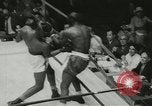 Standbild Polizei Athletic Boxing League Finale New York City USA, 1957, aus Sekunde 58 historischem Filmmaterial Videoclip 65675077125