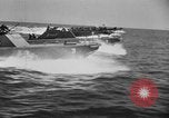 Image of landing boats United States USA, 1944, second 38 stock footage video 65675077220