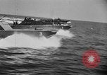 Image of landing boats United States USA, 1944, second 40 stock footage video 65675077220