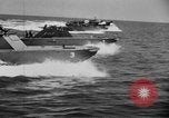 Image of landing boats United States USA, 1944, second 41 stock footage video 65675077220