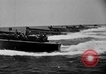 Image of landing boats United States USA, 1944, second 44 stock footage video 65675077220
