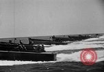 Image of landing boats United States USA, 1944, second 46 stock footage video 65675077220