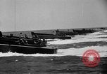 Image of landing boats United States USA, 1944, second 47 stock footage video 65675077220